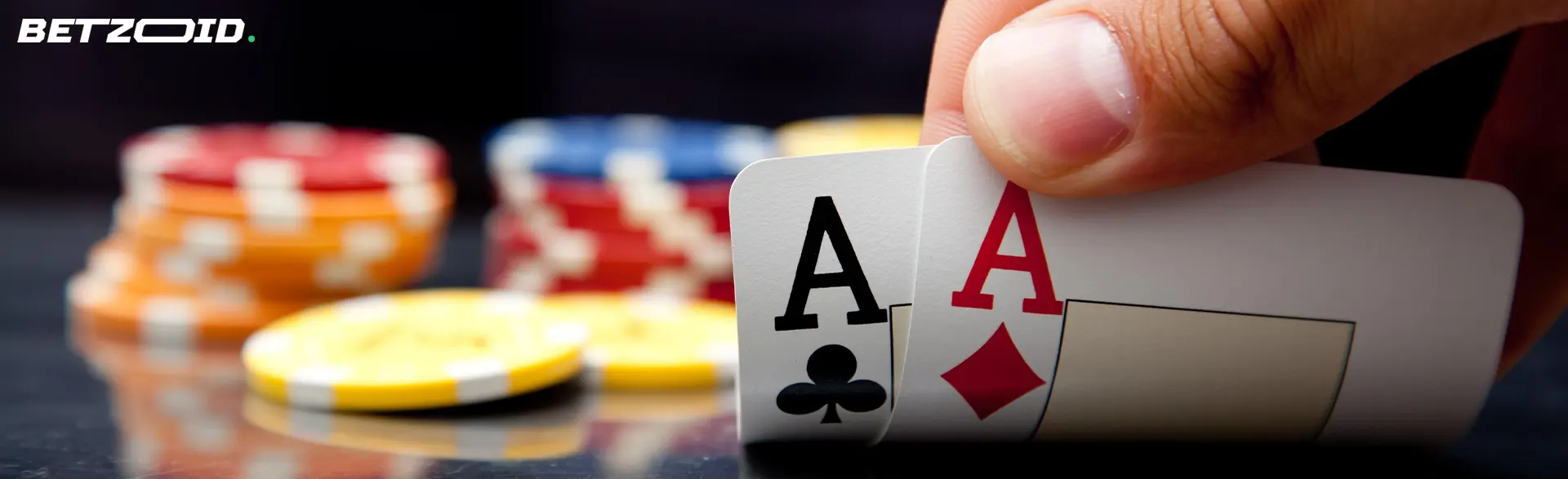 The player keeps the cards next to the chips on the table.