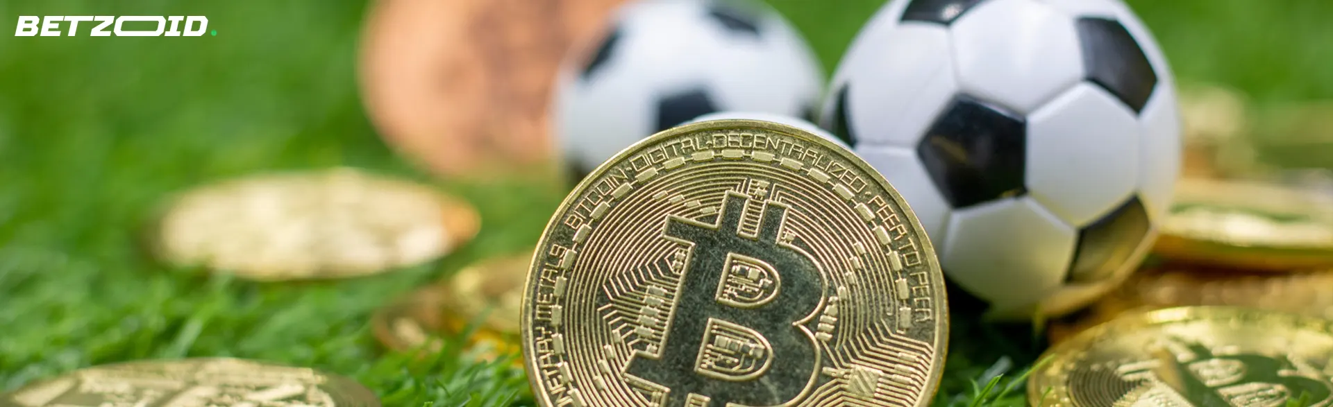 Bitcoin coins next to a soccer ball.