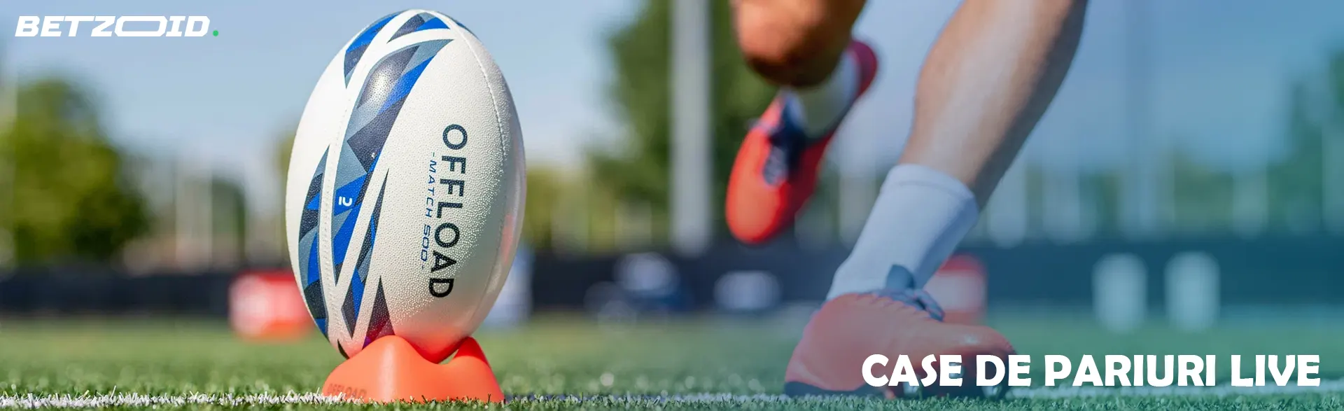 Un jucător se balansează pentru a lovi o minge de rugby.