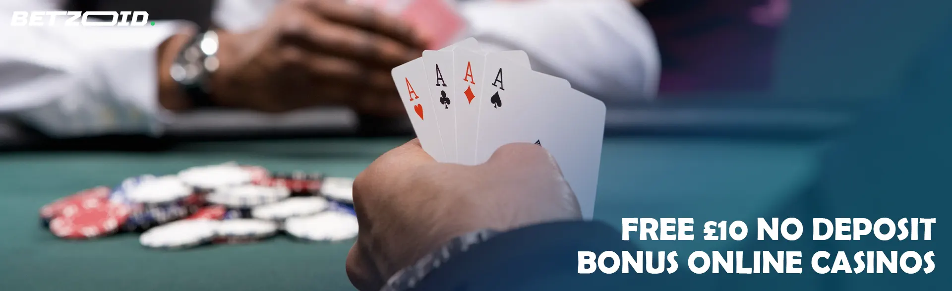 The player holds the cards next to the casino chips.