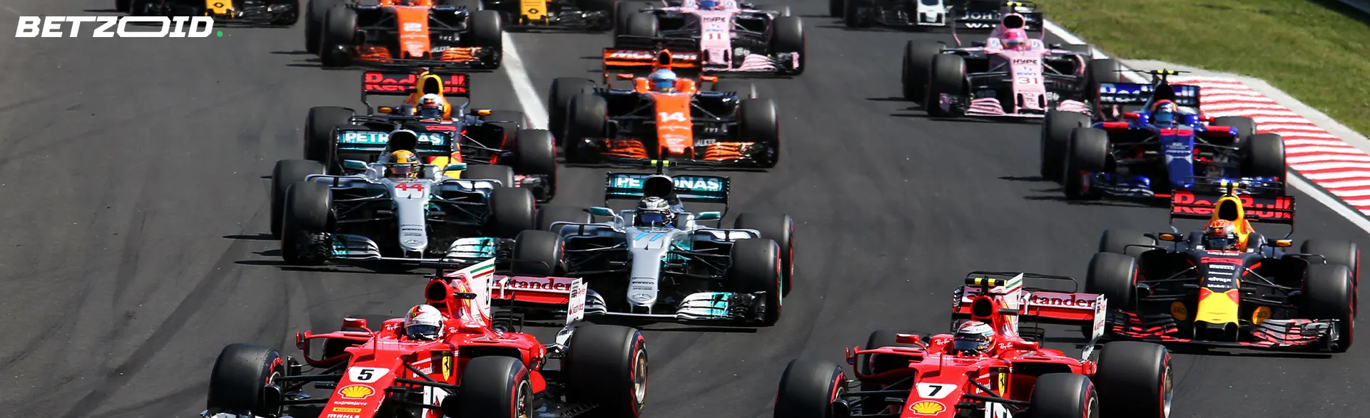 Formula 1 racing: cars compete on the track.