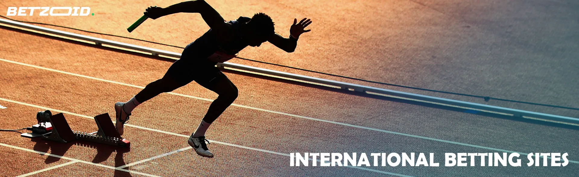 A runner starts on a track.