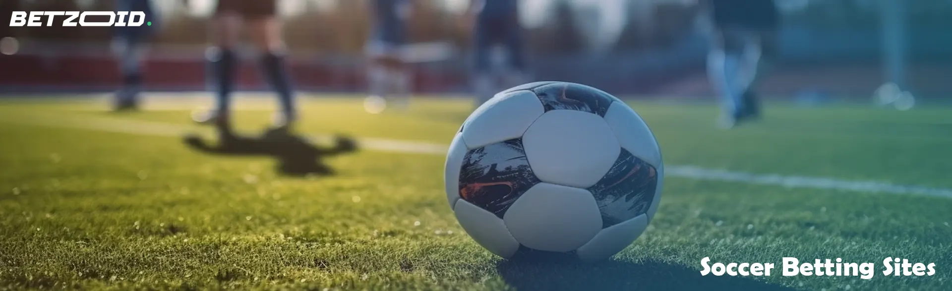 A soccer ball on a green field with players blurred in the background, related to soccer betting sites.