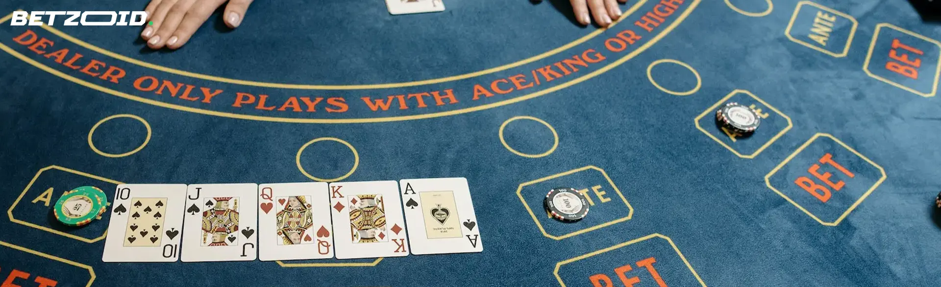 Cards and chips on the casino table.